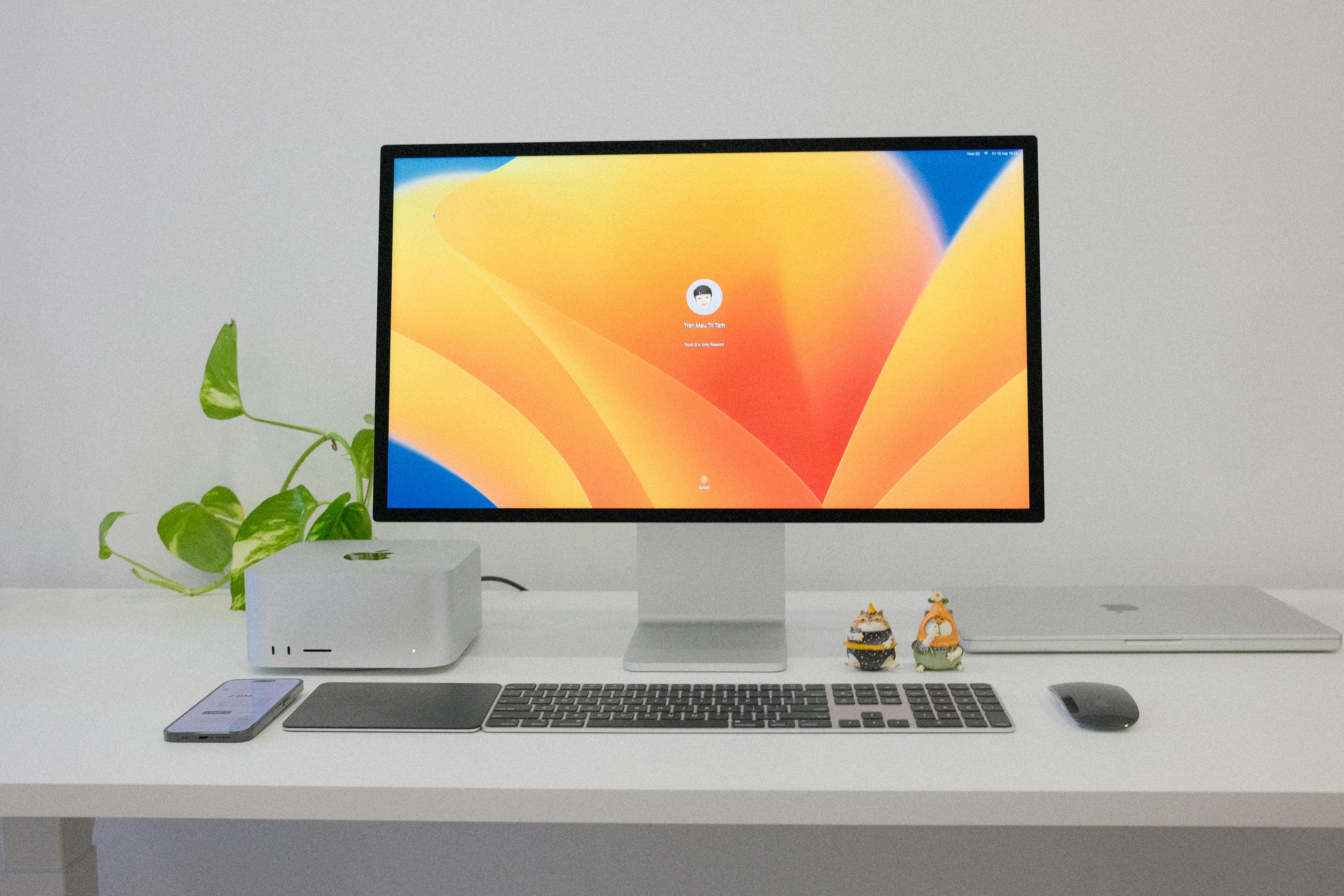 Minimalist home office setup with a single monitor and clean desk