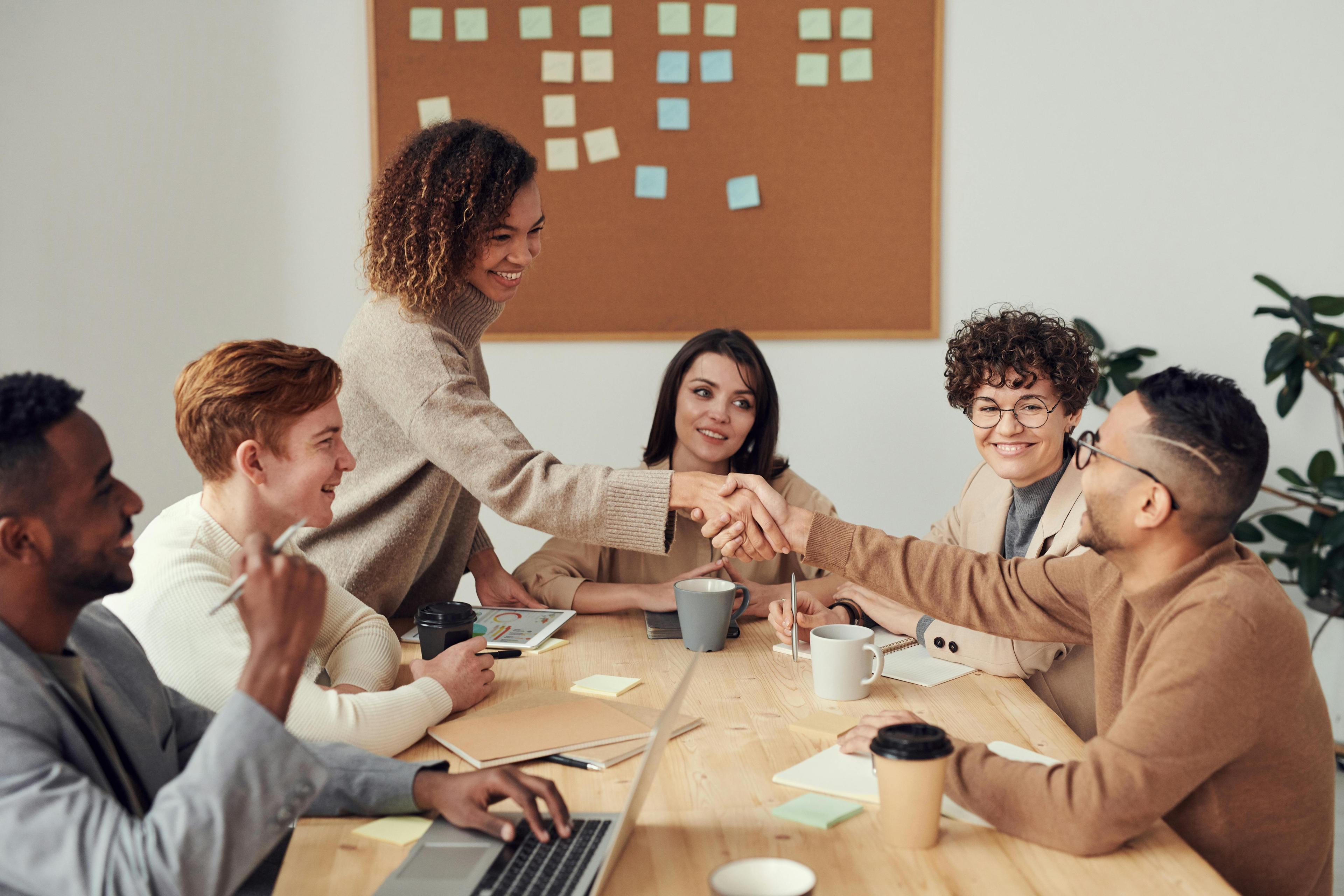 Team of professionals collaborating around a table in a meeting